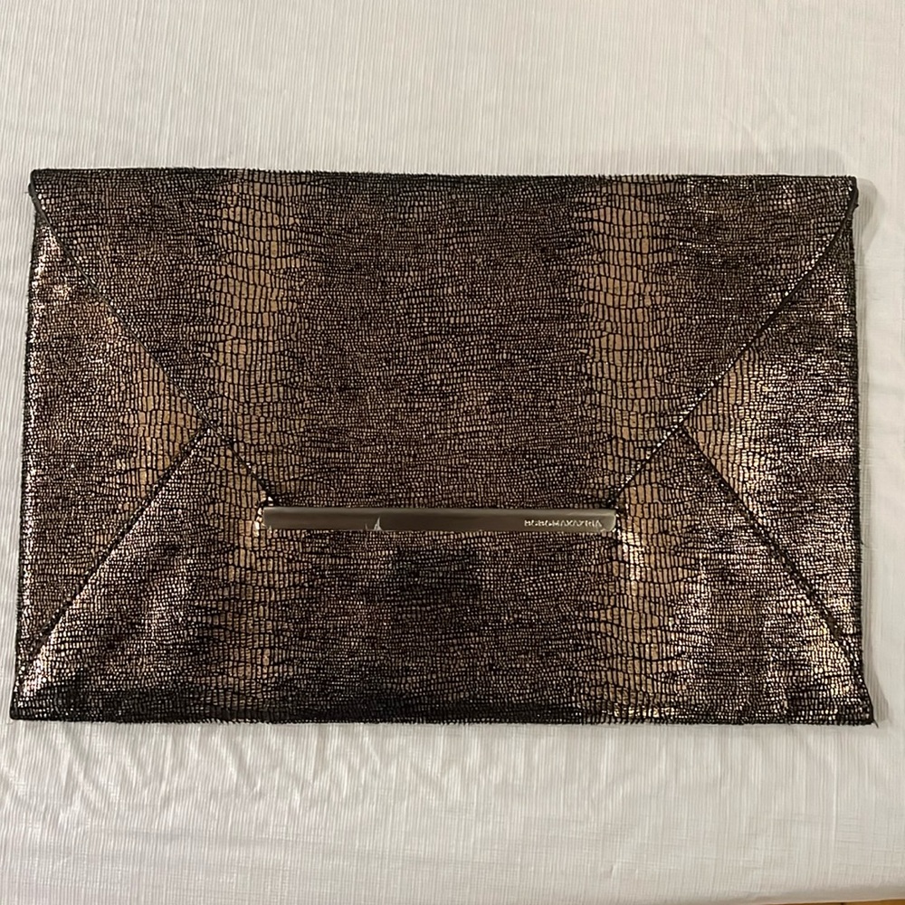 BCBG copper snake skin clutch